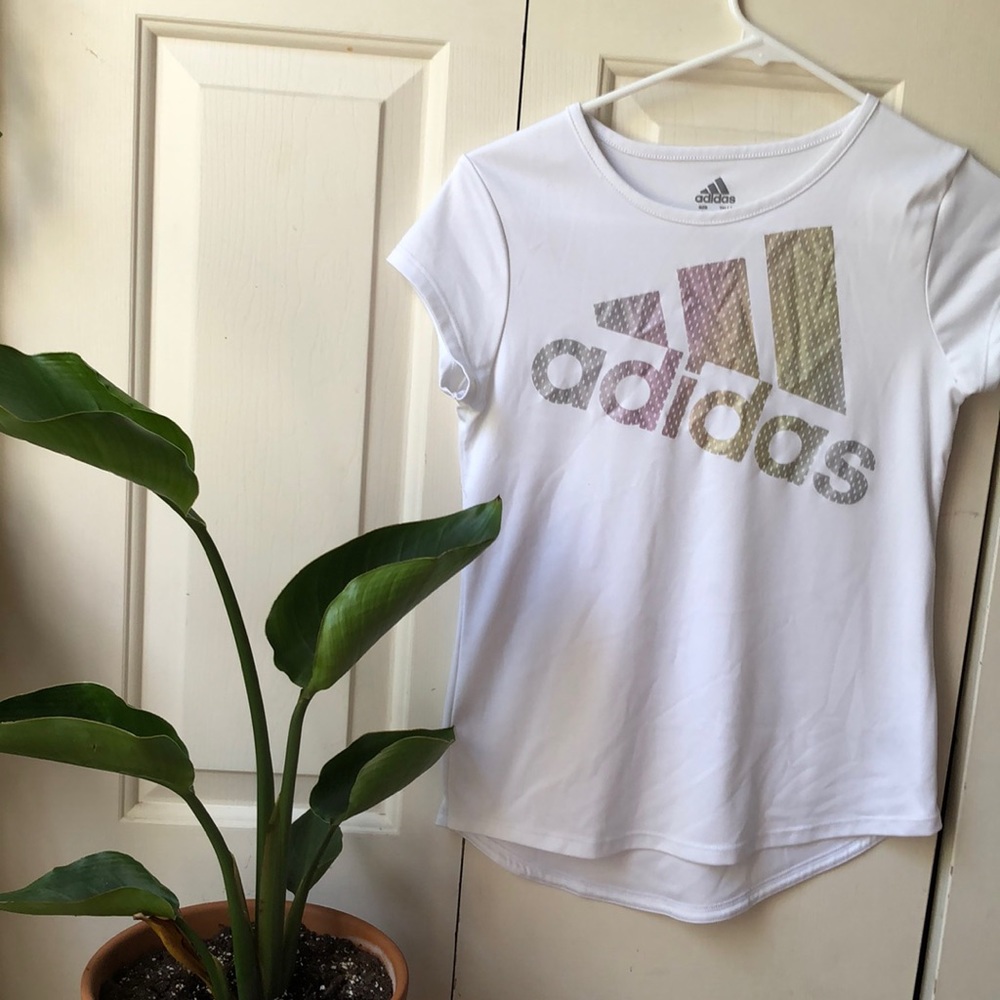White adidas shirt with pastel rainbow letters